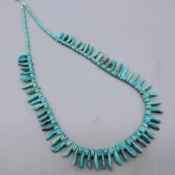 Laura Bl tab small1 — historical jewelry photograph