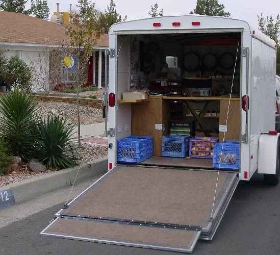 The open Windmill trading trailer, stocked with jewelry-making supplies
